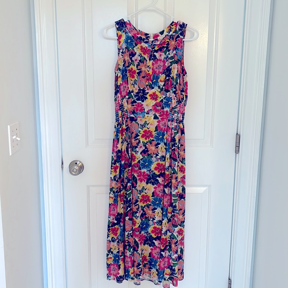 Brand new dress purchased in June. I’ve worn it once. It’s a beautiful dress!